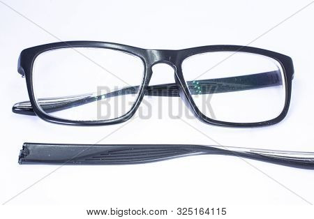 Image Of A Broken Eyeglass Or Spectacle Or Reading Glass Frame With White Background