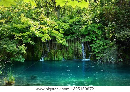 Waterfalls In Forest. Plitvice National Park, Croatia