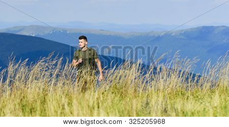 Battle Field. Man Ready To Fire. Hunter Hobby. Army Forces. Sniper Reach Target Mountain. Muscular M