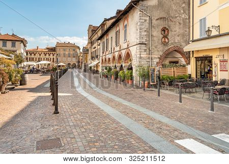 View Of Central Square - Piazza Del Popolo In Center Of Arona, Located On The Shore Of Lake Maggiore