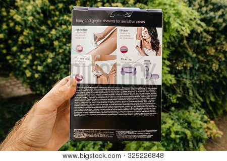 Paris, France - Sep 23, 2019: Pov Man Hand Rear Of Braun Silk Epil Women Lady Shaver Epilator 3 In 1