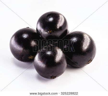 Brazilian Fruits Called Jabuticaba Or Jaboticaba. Isolated On White Background. Organic Fruit And No
