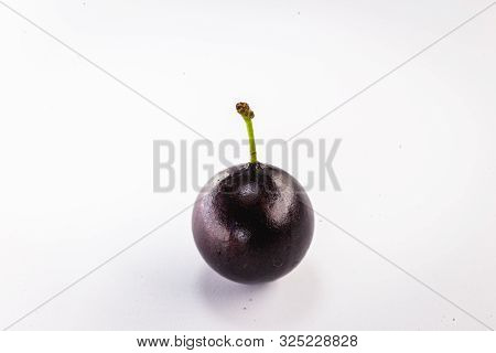 Brazilian Fruits Called Jabuticaba Or Jaboticaba. Isolated On White Background. Organic Fruit And No