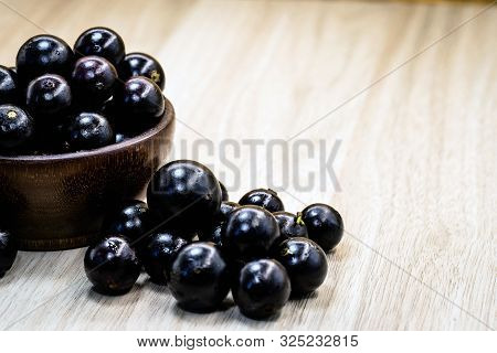 Fruit Called Jaboticaba Or Jabuticaba In A Basket On A White Background, Preserves Organic And Healt