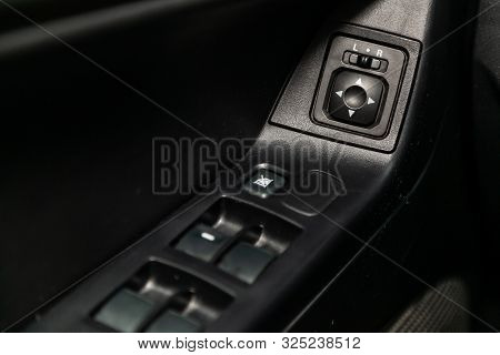 Novosibirsk, Russia - September 07, 2019:  Mitsubishi  Lanser, Close-up Of Black Of Mirror Buttons O