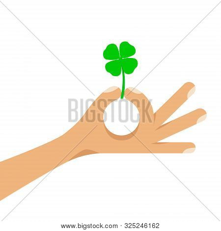 Four Leaf Lucky Green Clover Held In Human Hand. A Traditional Irish Symbol Of St.patrick. Flat Styl