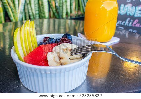 Delicious Red Fruits With Orange Juice