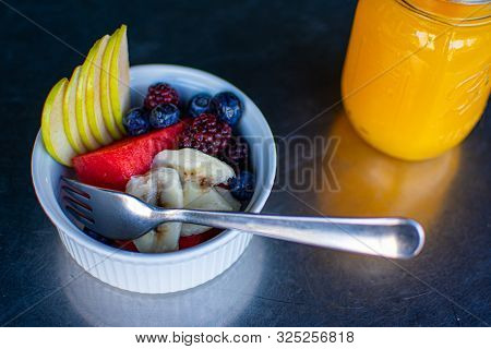 Delicious Red Fruits With Orange Juice