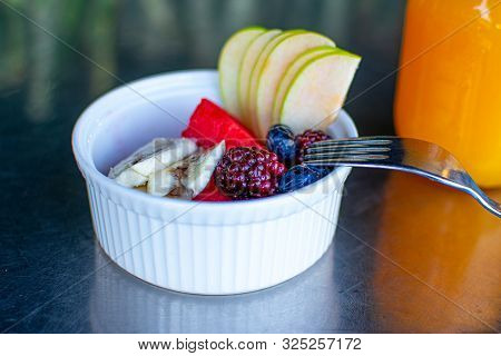 Delicious Red Fruits With Orange Juice
