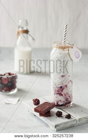Chia Pudding With Milk And Berries For Breakfast