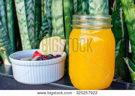 Delicious Red Fruits With Orange Juice