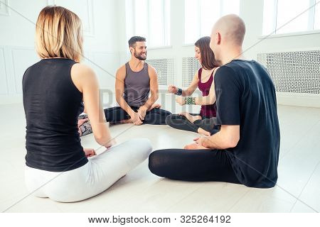 A Happy Group Of People From Men And Women Practicing Yoga In The Studio. Groups Of Meditation , Com