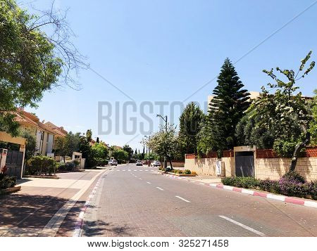 Holon, Israel  April 02, 2019: Private Houses, Trees And Streets In Holon, Israel.