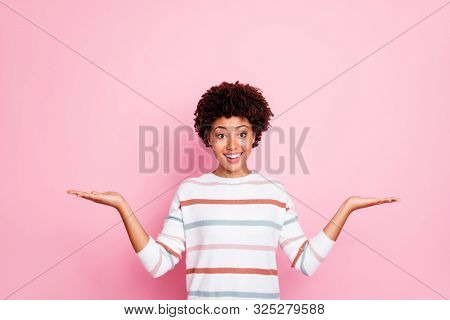 Photo Of Wavy Charming Nice Attractive Promoting Woman Darkish Skinned Showing You Two Option Held W