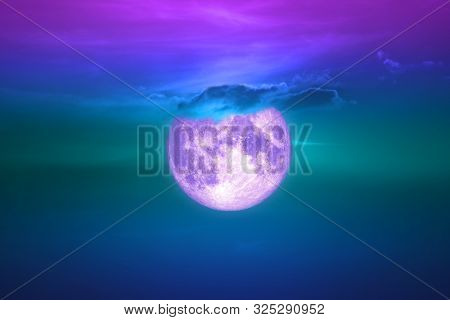 Full Harvest Moon On Dark Sky Back Evening Cloud Over Space