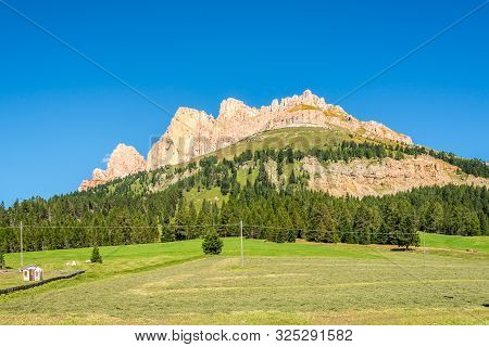 View At The Mountain Massif From Costalunga Pass In South Tyrol, Italy