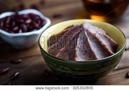 Anko Japanese Sweet Red Beans Served In Bowl On Wooden Table