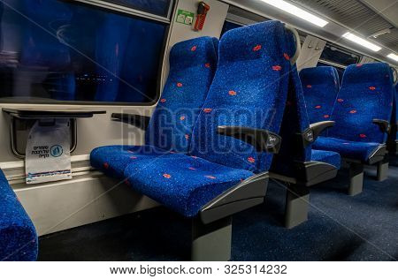 Nahariyya, Israel, September 17, 2019 : Rows Of Armchairs And A Table Near A Window In The Upper Com
