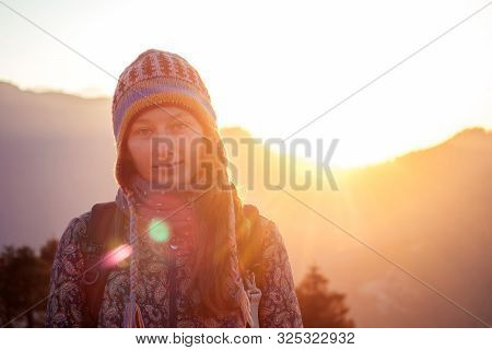 Smiling Young Beautiful And Active Woman In Trekking In The Mountains. The Concept Of Active Recreat