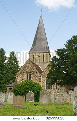 Guildford, England - August 2, 2019: Saint James Church At Shere In Surrey.