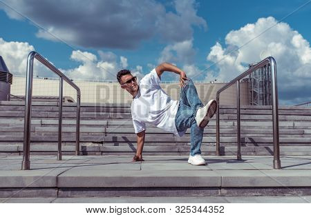 Male Athlete, Guy Dancer In Summer In City. Dancing In Motion, Break Dance, Fitness Outdoor Sports. 