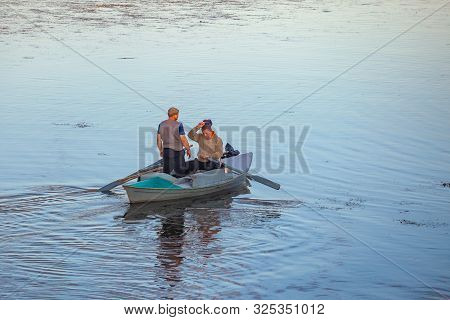Poti, Georgia - 01.09.2019: A Litte Boat And The Fishermen On The Lake In Paliastomi. Poti.