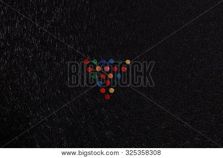 Colorful Small Bindiya Stickers In A Rectangle Shape On Black Background