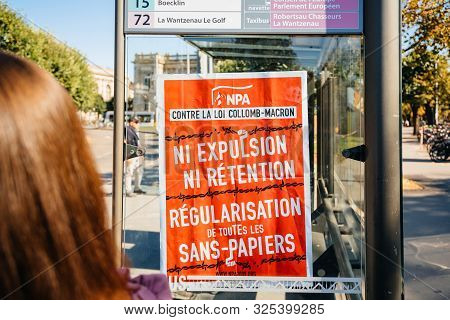 Strasbourg, France - Sep 21, 2019: Against The Collomb-macron Rule On The Npa Banner On Bus Station 
