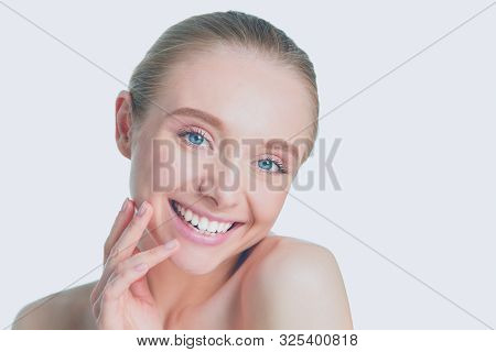 Portrait Of Beautiful Woman With Natural Make Up On White Background