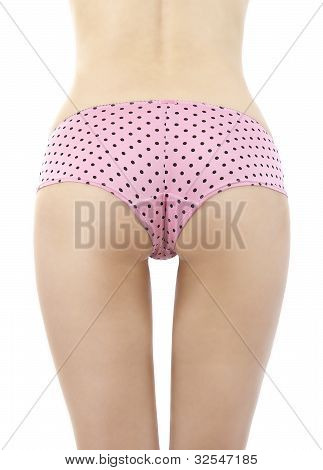 분홍색 팬티를 입고 젊은 여자의 섹시 한 뒷면