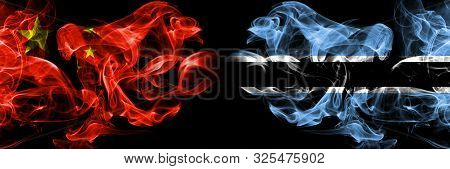 China Vs Botswana, Botswanan Smoke Flags Placed Side By Side. Thick Colored Silky Smoke Flags Of Chi