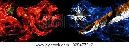 China Vs Marshall Islands Smoke Flags Placed Side By Side. Thick Colored Silky Smoke Flags Of Chines