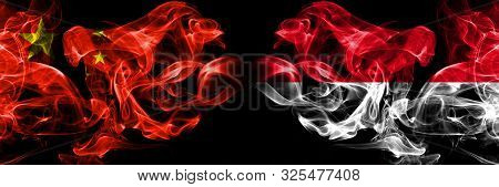 China Vs Monaco, Monacan Smoke Flags Placed Side By Side. Thick Colored Silky Smoke Flags Of Chinese
