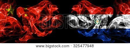 China Vs Paraguay, Paraguayan Smoke Flags Placed Side By Side. Thick Colored Silky Smoke Flags Of Ch