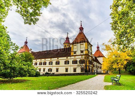 View At Eggenberg Palace In Autumn Tourist Spot, Famous Travel Destination In Styria.