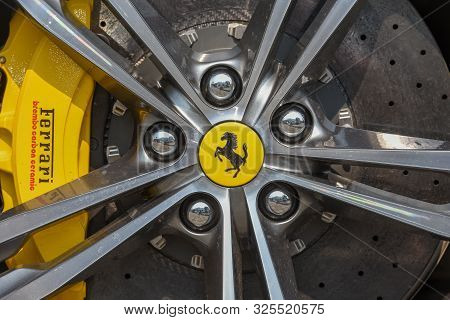 Ferrari Logo On The Wheel Of A Car