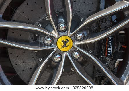Ferrari Logo On The Wheel Of A Car