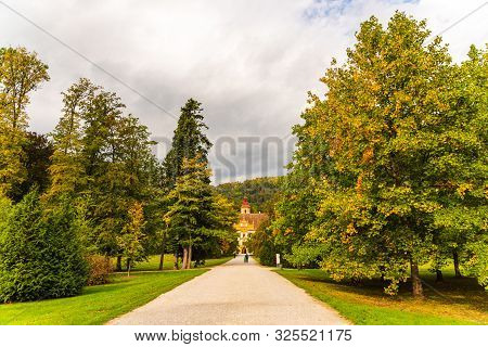 View At Eggenberg Palace In Autumn Tourist Spot, Famous Travel Destination In Styria.
