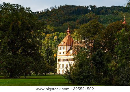 View At Eggenberg Palace In Autumn Tourist Spot, Famous Travel Destination In Styria.