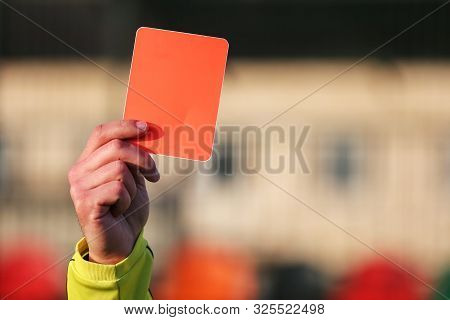 Football Referee Shows A Red Card. Disqualification