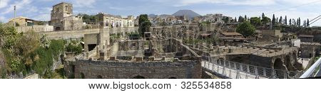 Panoramic View Of Herculaneum Ancient Roman Ruins. This Ia An Unesco World Heritage Site. At The Bac