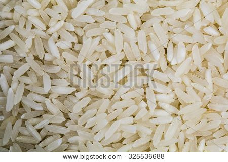 Approach Texture Of Uncooked White Rice Grains