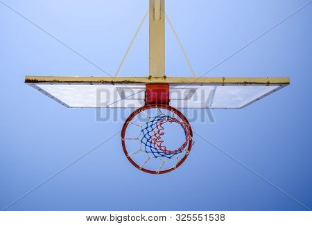 Basketball Hoop On A Background Of Blue Sky