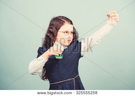 Child Study Bilogy Lesson. Discover Future. Small Girl Scientist With Testing Flask. Education And K