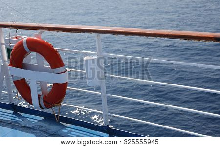 Red Lifebuoy On The Cruise Liner During The Travel On The Ocean