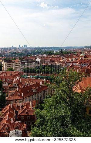 View On Prague Panorama With Red Roofs And Historic Architecture From Staromestska Radnice, Old Town
