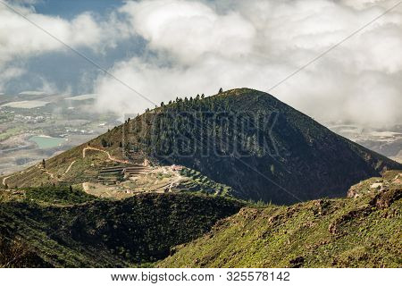 Aerial View Of Green Mountains And Southern Coast Of Tenerife From Macizo De Adeje. Warm Sunny Day A