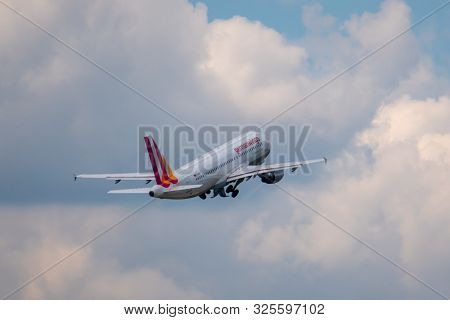 Zurich, Switzerland - July 19, 2018: Germanwings airlines company airplane flying in cloudy sky