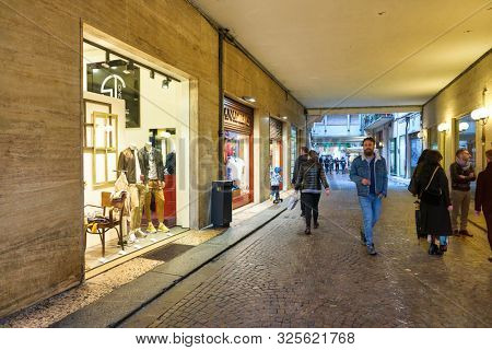 VERONA, ITALY - CIRCA MAY, 2019: display window of a shop in Verona in the evening.