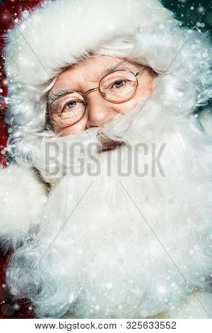 A close up portrait of Santa Claus. Merry Christmas and Happy New Year!